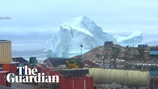 Huge iceberg threatens small Greenland village with tsunami [upl. by Hellene]