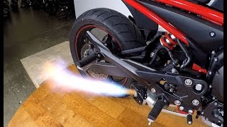 Why do motorcycles shoot fire explained with science [upl. by Nnylyam]