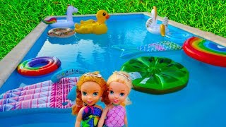 Elsa and Anna toddlers swimming pool games [upl. by Dolora]