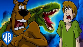 ScoobyDoo  Dangerous Dinosaur  WB Kids [upl. by Lynus]