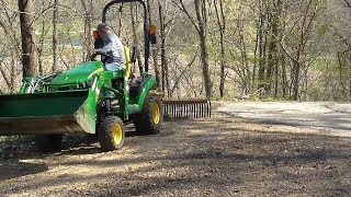 Tarter 6 Ft Landscape Rake  John Deere 1025  94 [upl. by Eneleahs357]