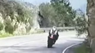 Motorcycle flips over cliff in scary crash caught on tape [upl. by Hesketh]