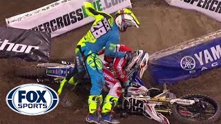 Riders fight after crash at Supercross event  FOX SPORTS [upl. by Dnalsor]